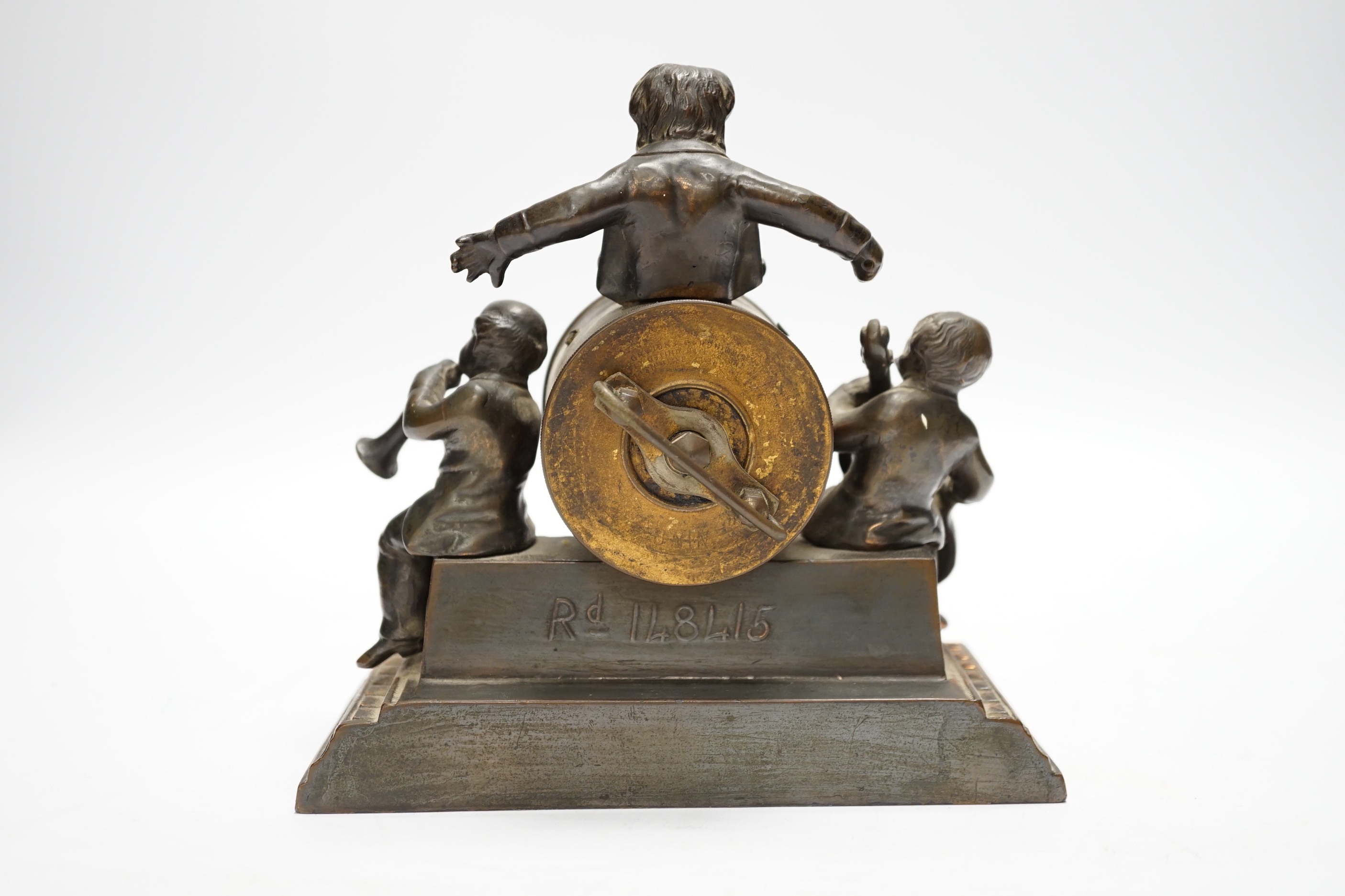 A bronzed 'musicians' mantel timepiece, 17cm